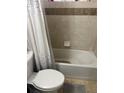 Practical bathroom showcasing a standard tub and shower setup at 9041 Lilly Ct, Thornton, CO 80229