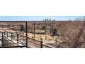 Balcony view featuring the city skyline and surrounding neighborhood at 8500 W 62Nd Ave # D, Arvada, CO 80004