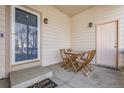 Cozy front patio with seating area, perfect for relaxing and enjoying the outdoors at 20630 E Ithaca Pl, Aurora, CO 80013