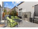 Enjoy outdoor living on this beautiful patio with a stone fireplace and comfortable seating at 354 Milwaukee St, Denver, CO 80206