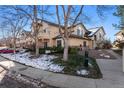 Townhome community showcasing building exteriors and landscaping at 8671 E Dry Creek Rd # 721, Englewood, CO 80112