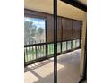 Enclosed balcony area with views of the outdoors at 13601 E Marina Dr # 305, Aurora, CO 80014