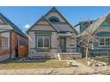 Charming home with unique architectural details and colorful accents at 3613 Julian St, Denver, CO 80211