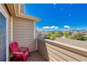 Enjoy the beautiful Colorado weather from this unit's private balcony with a comfortable chair at 4760 S Wadsworth Blvd # 302, Littleton, CO 80123