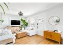 Bright living room with hardwood floors and modern decor at 4401 Vrain St, Denver, CO 80212