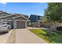 Charming front yard and well-maintained lawn enhance the curb appeal of this inviting two-story home at 11062 Gaylord St, Northglenn, CO 80233