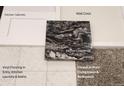 Kitchen showcasing cabinet, countertop, flooring, carpet and wall color samples for a modern design at 9264 Biscay St, Commerce City, CO 80022