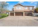 Spacious three-car garages for ample parking and storage, offering convenience and functionality at 6202 Kilmer Loop # 202, Golden, CO 80403