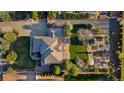 Top down aerial view of a home with a manicured lawn and garden at 5925 Zinnia Ct, Arvada, CO 80004