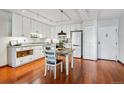 Bright kitchen featuring stainless steel appliances and granite counters at 3465 S Poplar St # 506, Denver, CO 80224