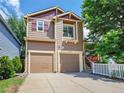 Attractive two-story home featuring a two-car garage and neat landscaping, perfect for Gathering living at 1288 S Beeler Ct, Denver, CO 80247
