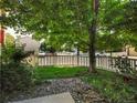Well maintained front yard featuring a healthy lawn and rock garden at 1288 S Beeler Ct, Denver, CO 80247