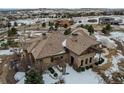 Luxury home with stone exterior, large backyard, and mountain views at 4691 Bandera Pl, Parker, CO 80134