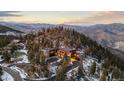 Mountaintop home with expansive views at 142 Outpost Ln, Evergreen, CO 80439