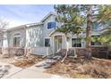 Charming two-story townhome with a welcoming entrance and well-maintained landscaping at 9604 Brentwood Way # B, Broomfield, CO 80021