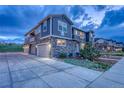 Charming townhome with a two car garage and neat landscaping at 24806 E Calhoun Pl # A, Aurora, CO 80016