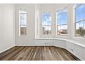 Spacious living room with bay window and wood floors at 2946 Central Park Blvd, Denver, CO 80238