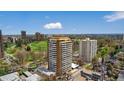 Stunning aerial view of the high-rise apartment building nestled amidst lush greenery and a vibrant cityscape at 1250 N Humboldt St # 1504, Denver, CO 80218