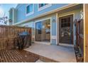 Cozy patio area with grill and sliding glass door access to the home at 7904 Chase Cir # 146, Arvada, CO 80003