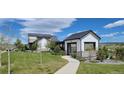 Modern clubhouse showcasing elegant architectural design and landscaped grounds, perfect for community gatherings at 9279 Merino Ct # B, Littleton, CO 80125