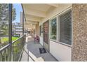 Welcoming porch area with view of the apartment complex at 384 S Ironton St # 201, Aurora, CO 80012