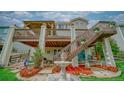 Backyard patio with a gazebo and a fountain, perfect for outdoor relaxing and entertaining at 9832 N Crystal Lake Dr, Littleton, CO 80125