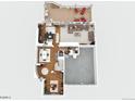 Second floor layout featuring open kitchen, living area, and a deck with outdoor seating at 9832 N Crystal Lake Dr, Littleton, CO 80125