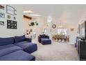 Spacious open-concept living area with tall ceilings and lots of natural light at 187 W Prestwick Ct, Castle Rock, CO 80104