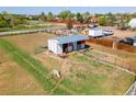 Picture of the metal shed with a large yard at 14347 E 134Th Ave, Brighton, CO 80601