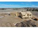 New construction home showcasing framing on a large lot with scenic views, offering an ideal canvas for a dream residence at 1286 Lisbon Dr, Parker, CO 80138