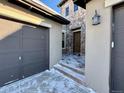 Front entrance with stone accents and a covered porch at 15454 W Auburn Ave, Lakewood, CO 80228