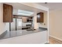 Bright kitchen with stainless appliances and wooden cabinets at 4281 S Salida Way # 8, Aurora, CO 80013