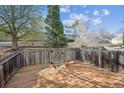 Private backyard with wooden deck and fenced-in yard, perfect for outdoor living at 3006 W 107Th Pl # D, Westminster, CO 80031