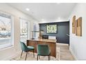 Bright office with a sleek desk, natural light, and modern decor, perfect for a productive workspace at 5128 W 26Th Ave # 311, Denver, CO 80212