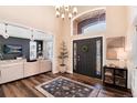 Bright and spacious entryway with high ceilings and hardwood floors at 27319 E Nova Cir, Aurora, CO 80016