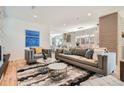Bright living room featuring modern furnishings, stylish decor, and hardwood floors at 814 S High St, Denver, CO 80209