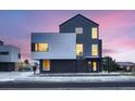 Striking contemporary home with unique architectural design and multi-toned exterior at 10151 W 38Th Ave, Wheat Ridge, CO 80033