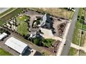 Large landscaped lot featuring a custom home, detached garage and various outbuildings at 15280 Bannock St, Broomfield, CO 80023