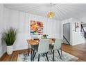 Bright dining room with a stylish table and chairs, perfect for enjoying meals with loved ones at 6885 E Briarwood Cir, Centennial, CO 80112
