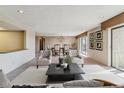 Bright, airy living room featuring sophisticated furniture and an open floor plan at 13631 E Marina Dr # 608, Aurora, CO 80014