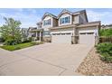 Charming home featuring a three-car garage and a spacious driveway in a lovely neighborhood at 2090 Bellavista St, Castle Rock, CO 80109