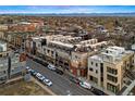 Street view of modern townhomes showing off their multi-level design and outdoor terraces at 4469 Tennyson St # 15, Denver, CO 80212