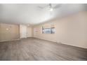 Bright living room with vinyl flooring and a view at 1832 Simms St, Lakewood, CO 80215