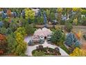 Luxury home surrounded by mature trees in a quiet neighborhood at 5320 S Race Ct, Greenwood Village, CO 80121