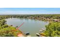 Gorgeous waterfront lot with private dock and boat slips on a serene lake setting at 4790 W Evans Ave, Denver, CO 80219