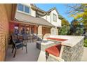 Cozy patio with fire pit and seating area at 4291 W Lake N Cir, Littleton, CO 80123