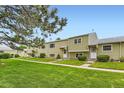 Charming row of townhouses with well-maintained lawns and inviting curb appeal at 5721 W 92Nd Ave # 96, Westminster, CO 80031