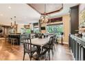 Elegant dining room with a stylish chandelier and hardwood floors at 14118 Whitney Cir, Broomfield, CO 80023