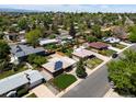 Residential neighborhood with mature trees and solar panels at 8641 Rutgers St, Westminster, CO 80031