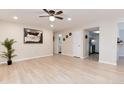 Open-concept living space boasting recessed lighting, neutral walls, and easy access to the kitchen and bathroom at 12172 Melody Dr # 102, Denver, CO 80234